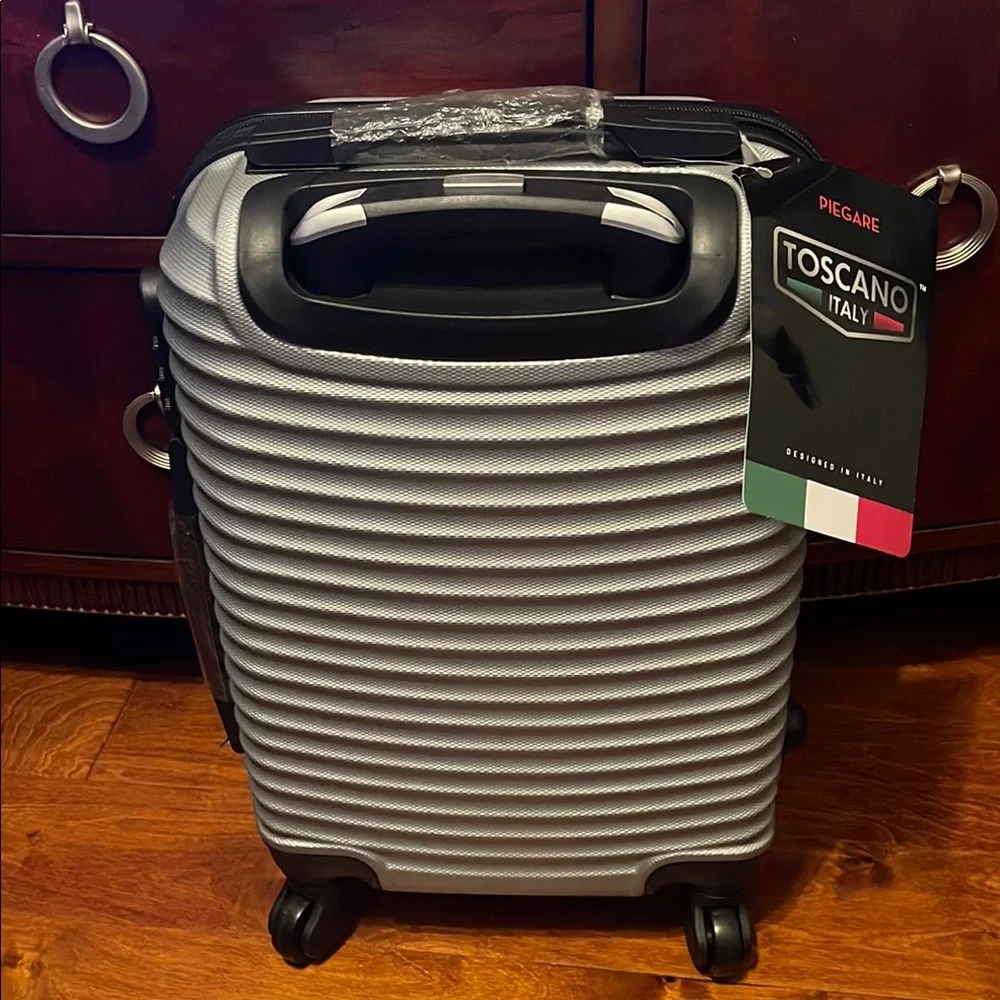 Silver and Black Cylindrical Storage Container with Wheels